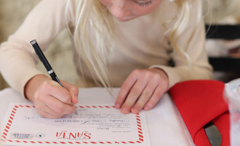 Girl writing a Letter to Santa